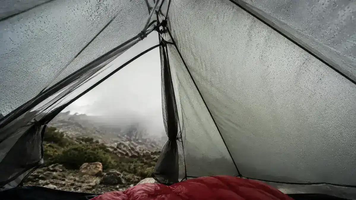 Interior view of the Naturehike Cloud-Up tent showing condensation on the inner wall and limited floor space